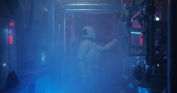 istock Humanoid robot working in a smoke filled lab 1151860983