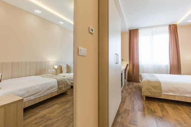 istock Hotel room interior,double bed beige bedroom 1151862435