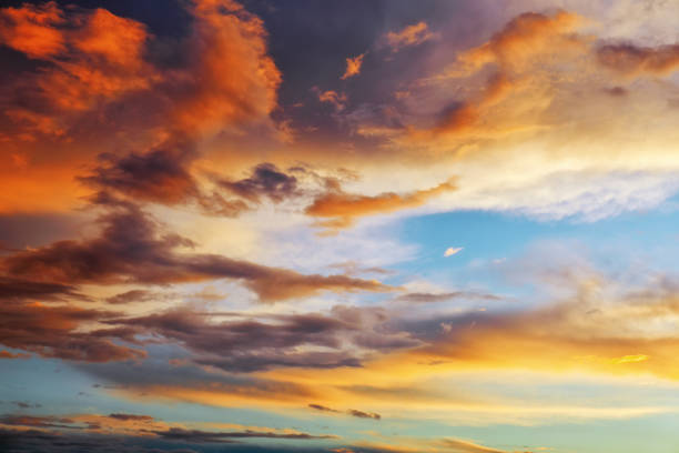 istock Beautiful dark fluffy cloudy sky. Sunset light. 1151863392