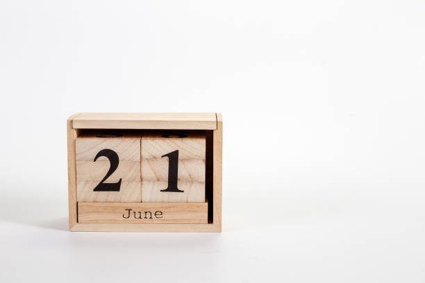 istock Wooden calendar June 21 on a white background 1151866956