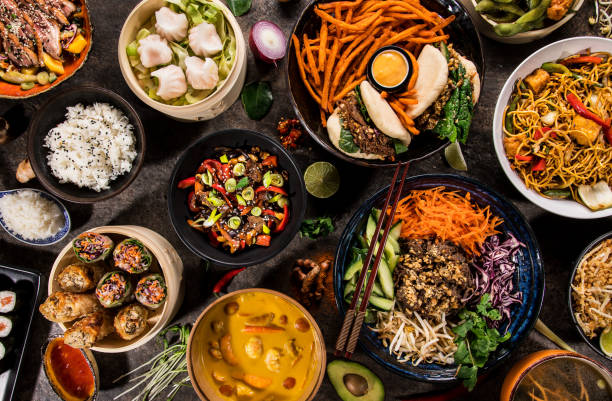 istock Asian food background with various ingredients on rustic stone background , top view. 1151868194