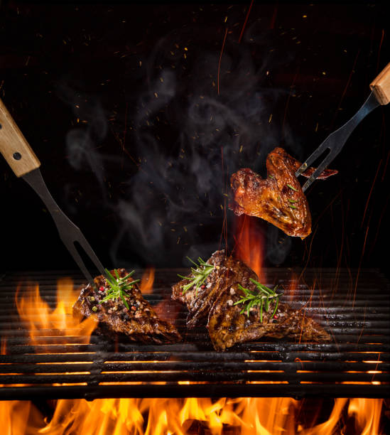 istock Beef steaks on the grill with flames 1151868248
