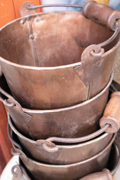 istock PIle of Rusty Iron or Copper bucket. London 1151869875