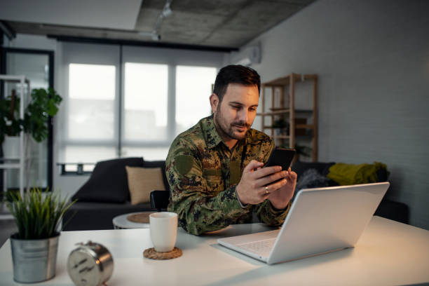 istock Army man with smart phone 1151871144