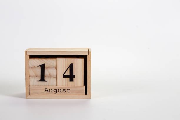 istock Wooden calendar August 14 on a white background 1151871237