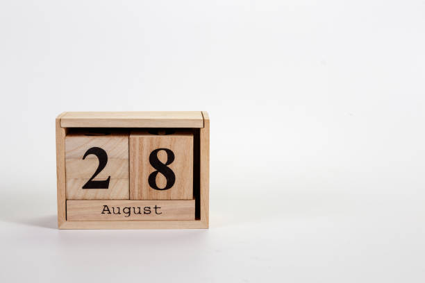 istock Wooden calendar August 28 on a white background 1151871289