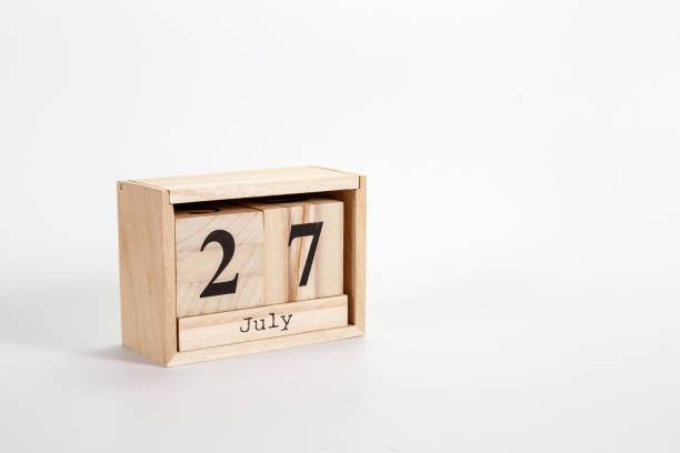 istock Wooden calendar July 27 on a white background 1151872032