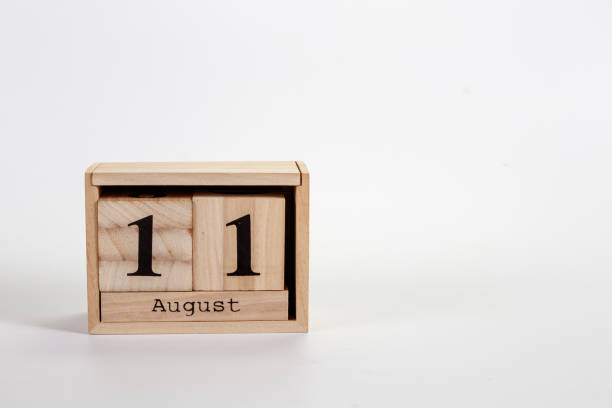 istock Wooden calendar August 11 on a white background 1151872044