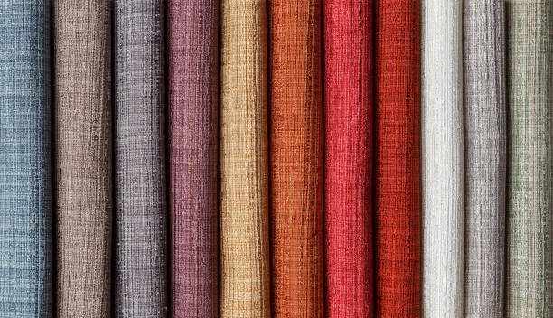 samples of multi-colored fabrics for curtains close-up. samples of multi-colored fabrics for curtains close-up. Selection of fabric for interior decoration fabric swatch stock pictures, royalty-free photos & images