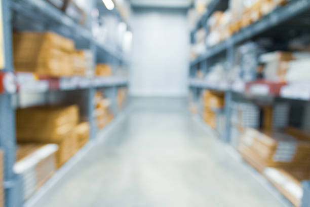 istock Blurred bix box store supercenter with customers shopping for home goods. 1151872382