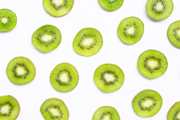 istock Ripe kiwi fruit slices isolated on white 1151874289