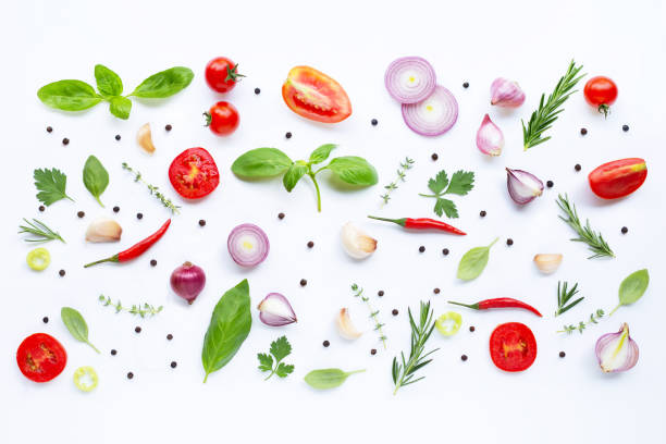 istock Various fresh vegetables and herbs on white background. Healthy eating concept 1151874304