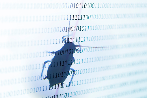 Bug On Binary Screen With One And Zero Stock Photo - Download Image Now ...