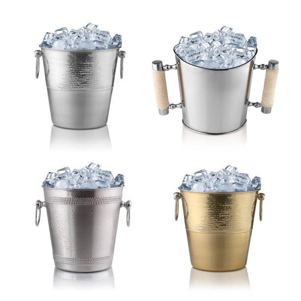 istock Champagne buckets full with ice. Isolated on white 1151876052