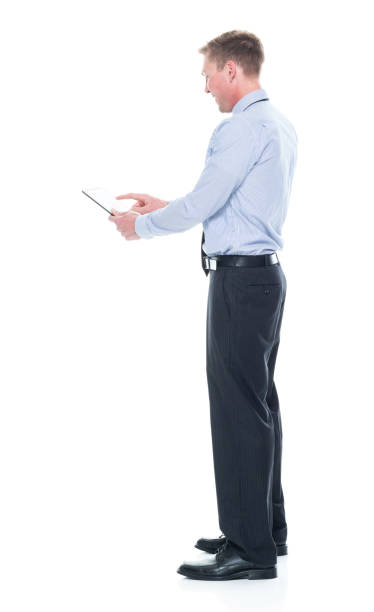 istock Handsome caucasian businessman in nice clothing - using tablet 1151880239