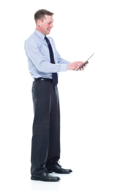istock Handsome caucasian businessman in nice clothing - using tablet 1151880246