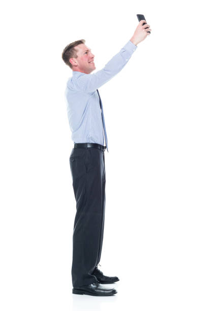 istock Handsome caucasian businessman in nice clothing - taking a selfie 1151880247