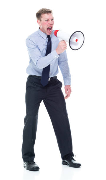 istock Handsome caucasian businessman in nice clothing - using a megaphone 1151880276