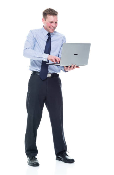 istock Handsome caucasian businessman in nice clothing - using a laptop 1151880329