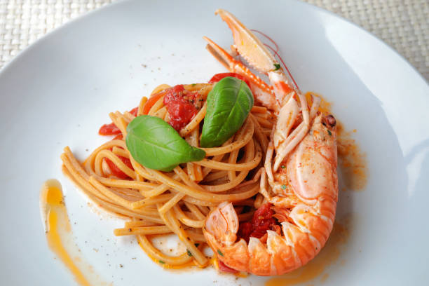 istock Spaghetti with scampi and tomato 1151886478