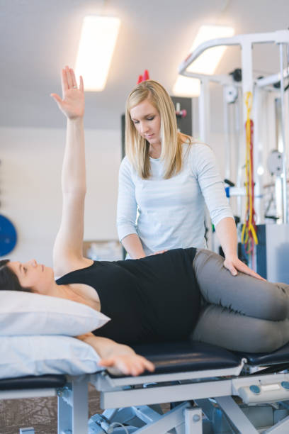 istock Pregnant woman doing physical therapy 1151887729