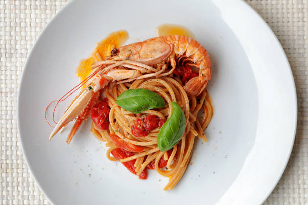 istock Spaghetti with scampi and tomato 1151887916