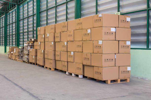 istock The rows of material boxes or product boxes in warehouse area. 1151892896