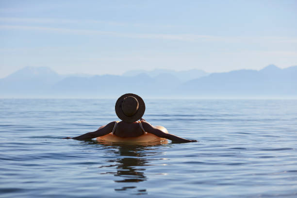 istock Dreamy girl on beach 1151893004