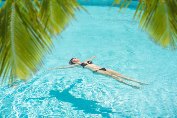 istock Women in the pool 1151902333