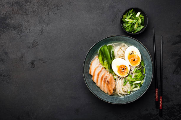 istock Asian ramen noodle soup with chicken 1151907712