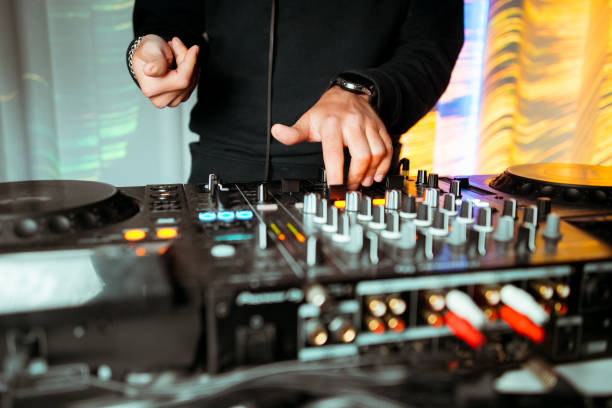 istock DJ playing music at mixer closeup 1151921626