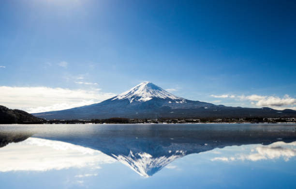 Mt. Fuji against blue sky Mt. Fuji against blue sky on a sunny day. Lake Kawaguchi stock pictures, royalty-free photos & images