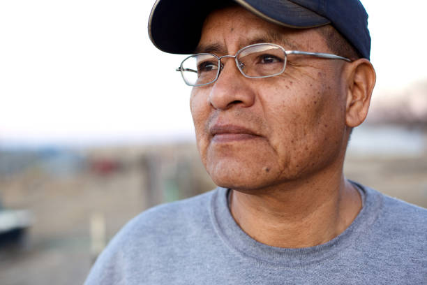 Native american people - Navajo male Portraits on native American Navajo Indian reservation - Navajo Nation in New Mexico (natural light at sunset) indigenous north american culture stock pictures, royalty-free photos & images