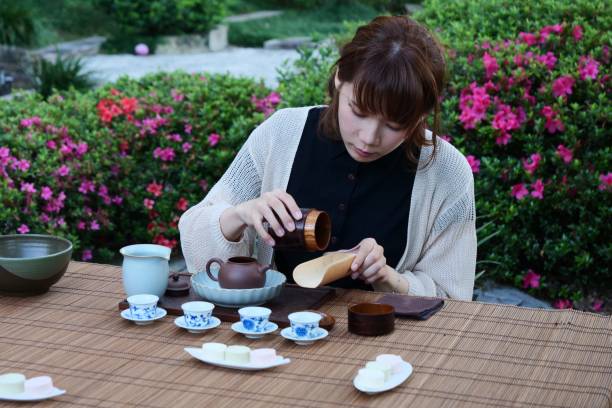 istock Host woman preparing tea - Chinese tea ceremony 1151925485