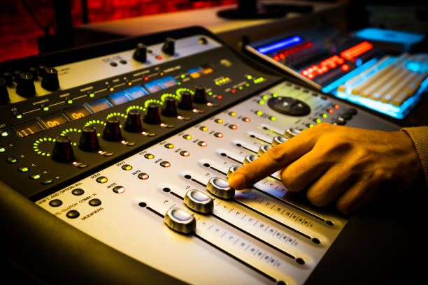 sound engineer, producer hand working on professional recording, broadcasting studio equipment - human finger sound mixer music producer imagens e fotografias de stock