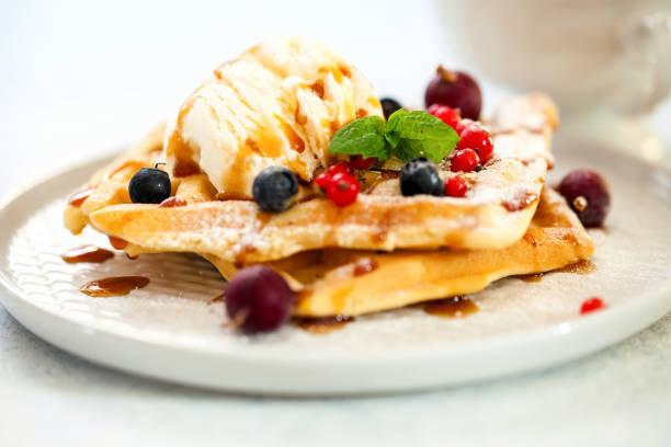 istock Homemade waffles with berries 1151927223