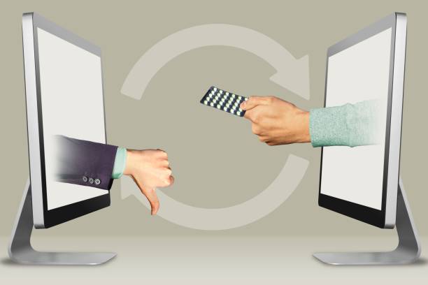 istock digital concept, two hands from computers. thumbs down, dislike and hand with medicine pills . 3d illustration 1151930248
