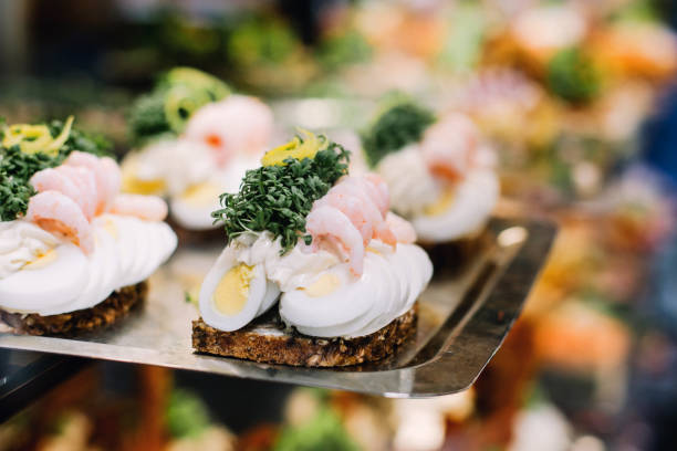 Traditional Danish Sandwiches in Copenhagen Open faced sandwiches on a ceramic plate in Copenhagen, Denmark danish culture stock pictures, royalty-free photos & images