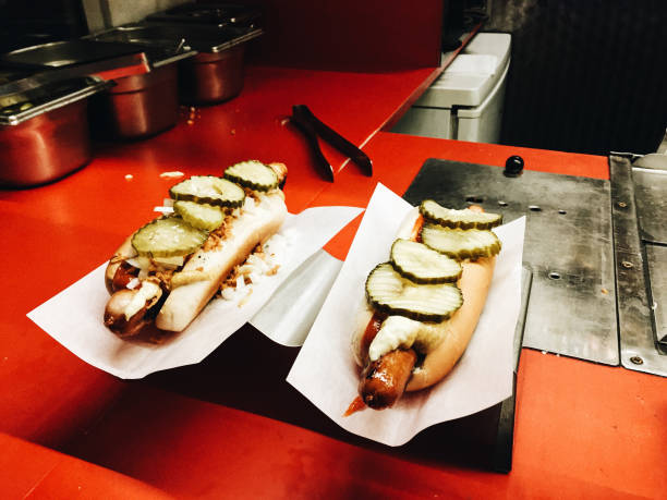 Danish hot dogs in Copenhagen Ordering traditional Danish hot dogs late at night in Copenhagen, Denmark danish culture stock pictures, royalty-free photos & images