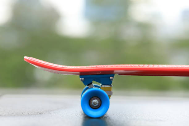 istock Red skateboard ready for riding at city 1151932745