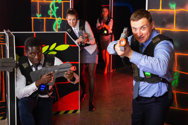 istock men and women co-workers having corporate entertainment 1151932942