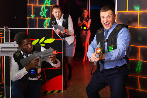 istock men and women co-workers having corporate entertainment 1151932943