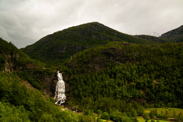 Panoramic view to Fossenbratte waterfall at Lona river in Samnanger , Norway