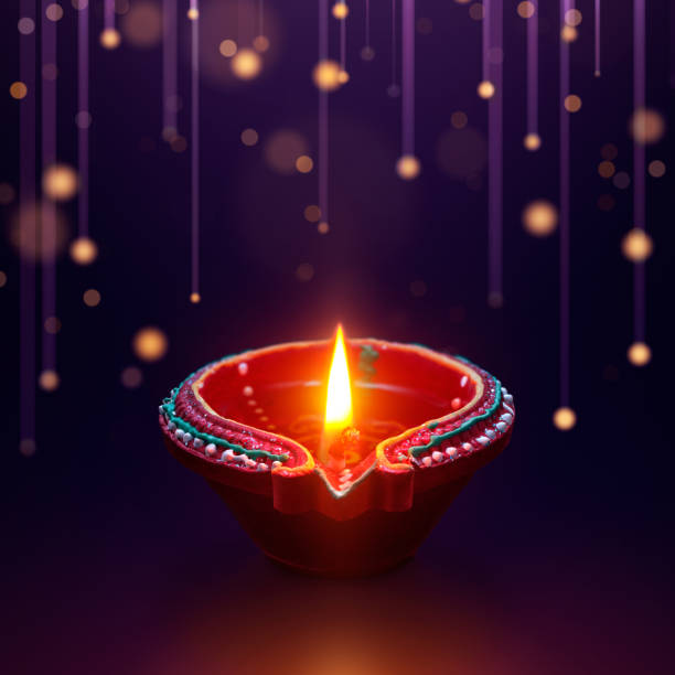 дия масляная лампа с висячим световым фоном, празднование дивали - diya стоковые фото и изображения
