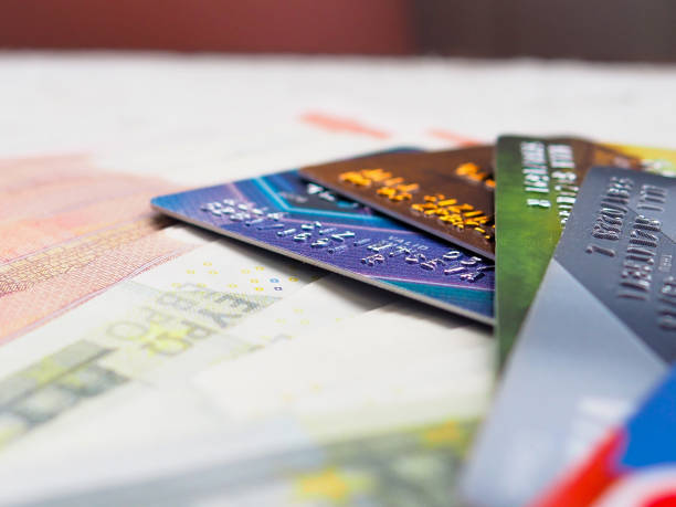 istock Credit card and may euro bills as background 1151934877