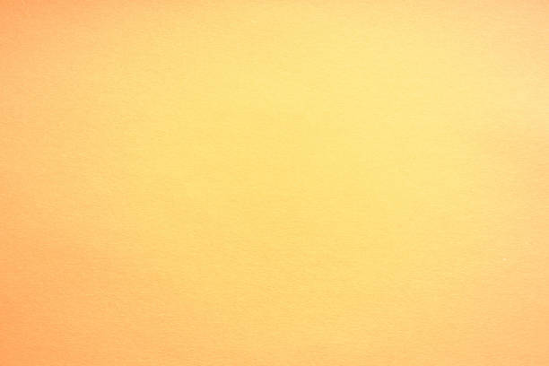 istock Paper background peach color. Rough paper texture. Closeup. Macro. 1151936530