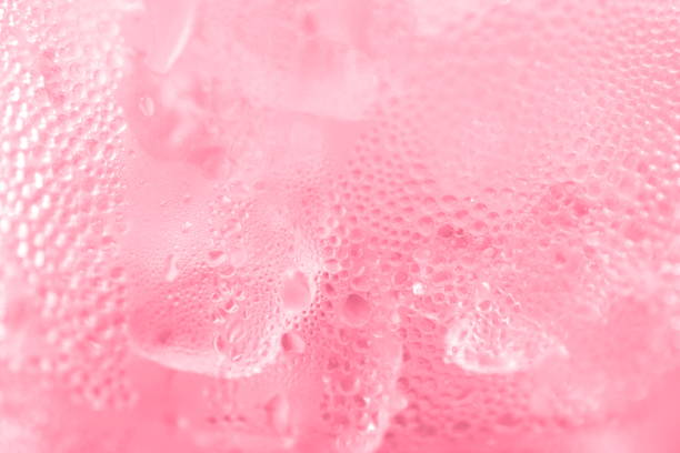 istock water drop soda ice baking background fresh cool ice pink texture, selective focus 1151939618