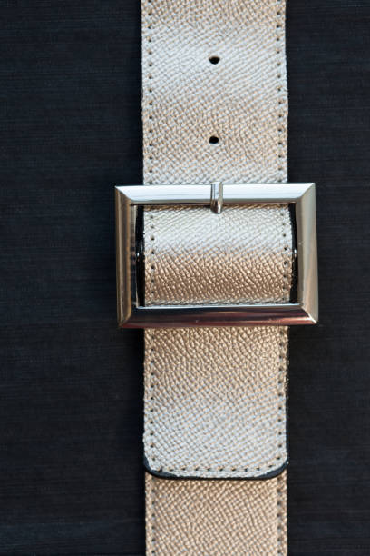 istock Gold-colored leather belt, nahupshot 1151941349