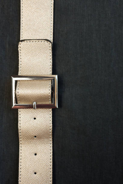 istock Gold-colored leather belt, nahupshot 1151941407