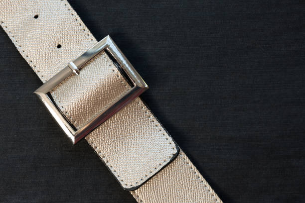 istock Gold-colored leather belt, nahupshot 1151941684